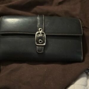 Coach wallet. Color is black room for credit cards